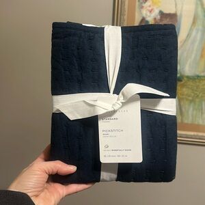 Pottery Barn pick stitch standard shams. Two navy blue unopened shams